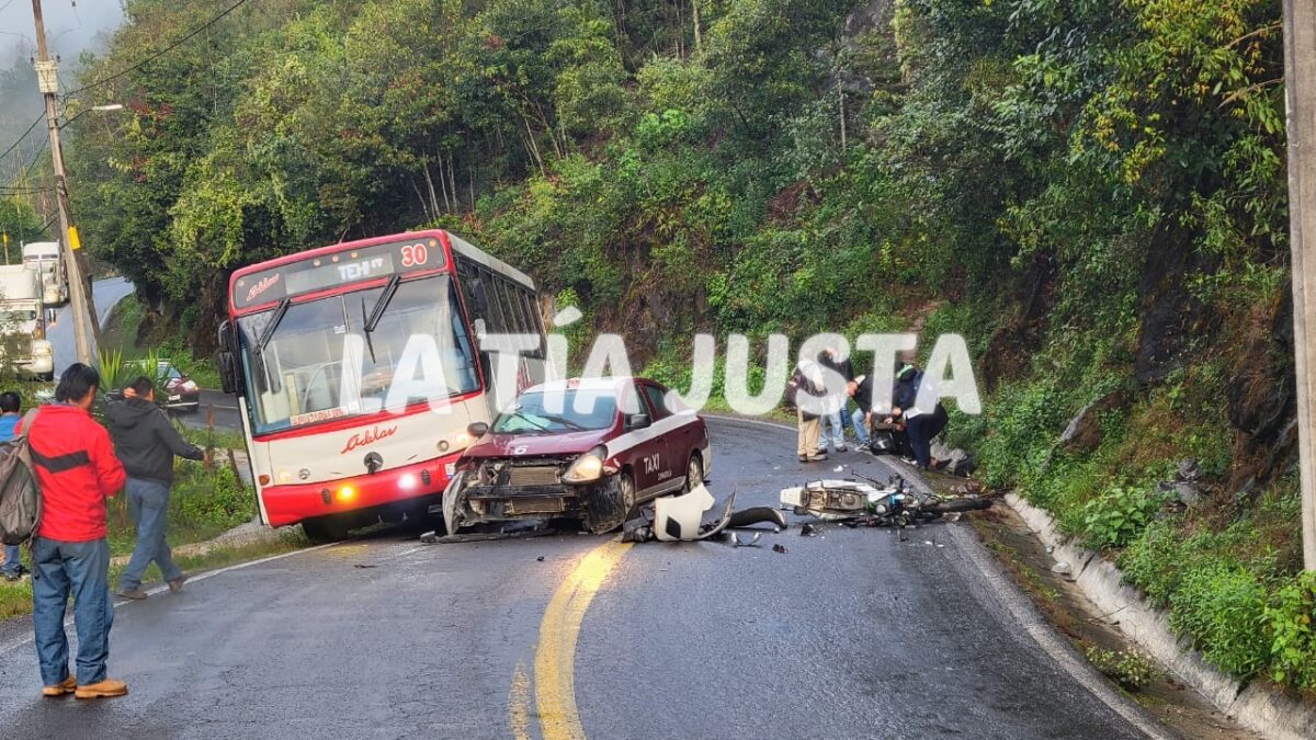 TAXISTA EMBISTE UN MOTOCICLISTA AL INVADIR EL CARRIL CONTRARIO.