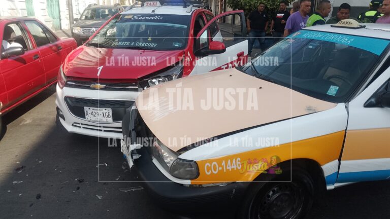 TRES LESIONADOS EN CHOQUE DE TAXIS