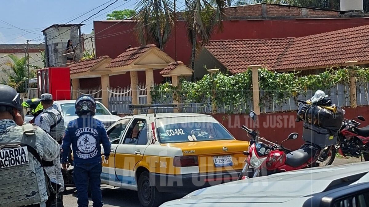 SE DAN EN SU MAUSER TAXISTA Y MOTOCICLISTA