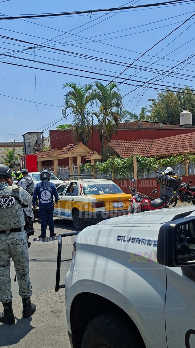 SE DAN EN SU MAUSER TAXISTA Y MOTOCICLISTA
